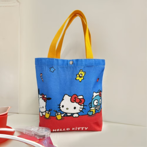 Hello Kitty cotton tote bag with blue and red design and yellow handles
